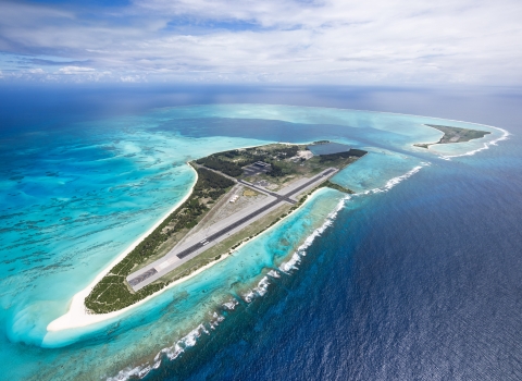 Midway Atoll National Wildlife Refuge aerial view showing Sand Island and Eastern Island.