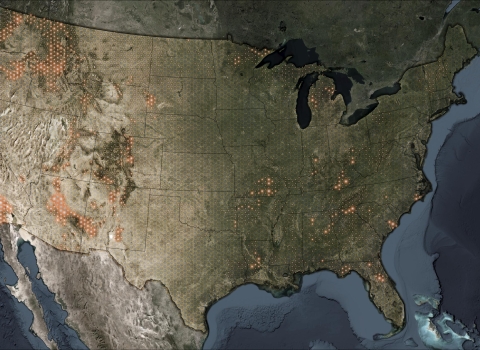 Map of the US with orange dots where wildfires have occurred.