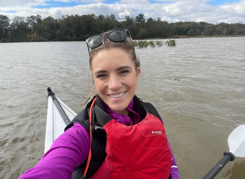 a selfie of a woman in a kayak