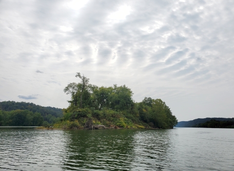 Grandview Island with dramatic clouds overhead
