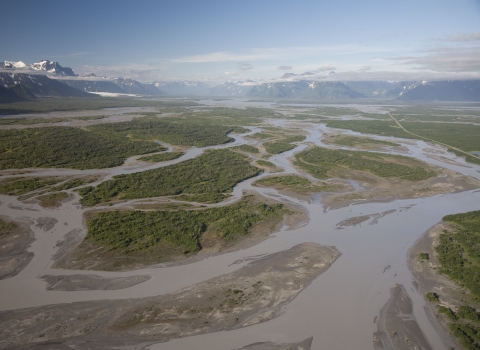 A river delta with mountains in the background