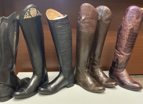 Display of boots that made from and trimmed with protected species such as elephant, python, and crocodile..