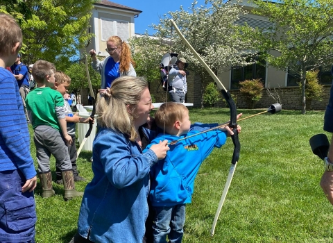 Child shooting soft tip archery