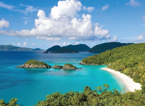 Shoreline of Virgin Island National Park with cays in the mid and background.