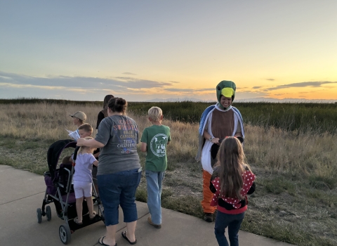 A photo of visitors on the Enchanted Trail at Bear River Migratory Bird Refuge during the Creature Crawl