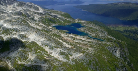 aerial of misty fords, deep glacial valleys, and lofty mountains distinguish the 1.9 million-acre refuge. 